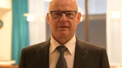 Face Of Handsome Senior Businessman Smiling In The Office