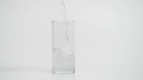 Fresh Water Pouring into a Glass