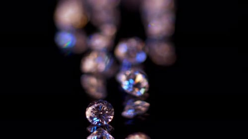 Sparkling Diamonds on Reflective Black Background