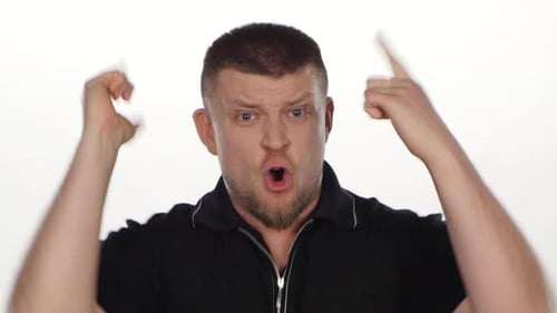 Angry Man Yelling and Threatening with Hand Gestures