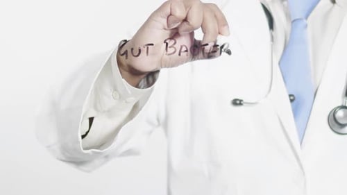 Asian Doctor Writes Gut Bacteria