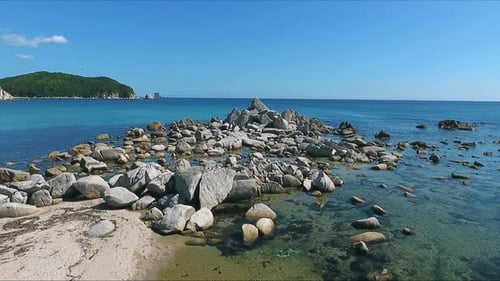 Aerial Shot of Coastline Bay with the Rocks and Cliffs