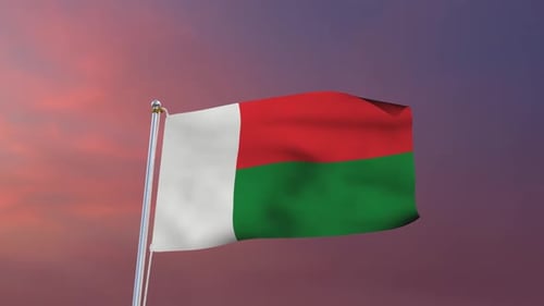 Madagascar Flag Waving on a Pole Against a Sunset Background