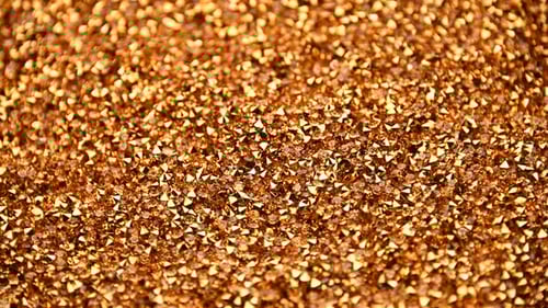 Amber Rhinestones Glittering in a Close Up Shot