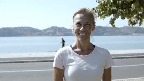 Portrait of Happy Mature 50s Woman in Sportswear