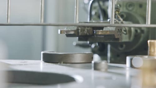 Automated assembly line for metal parts in the automotive industry