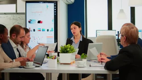 Diverse Business Team Meeting in Modern Office