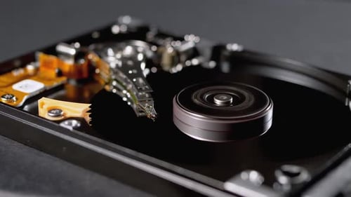 Hard Disk Drive Inside. Structure of HDD, Spinning Platter. Move Magnetic Head