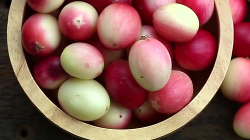 Karanda Berries in a Wooden Bowl, Close Up