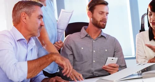 Business People Meeting in Office with Handshake
