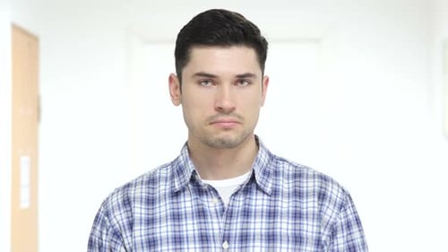 Shaking Head to No Rejecting Handsome Man in Office