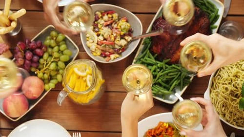 Friends Toasting at a Delicious Dinner Party