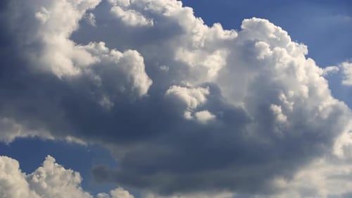 Billowing White Clouds Against a Vivid Blue Sky