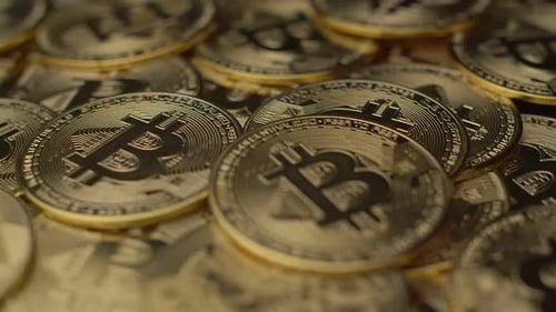 Pile of Gold Bitcoin Cryptocurrency Coins Close Up