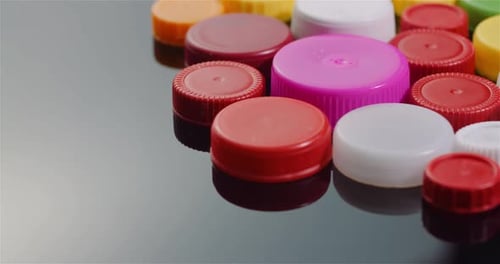 Few Plastic Bottle Caps - Plastic Processing Recycling Industry