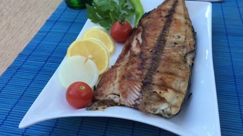 Grilled Fish and Fresh Vegetables on a Plate