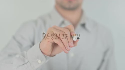 Writing Resilience with Marker on Glass, Close Up