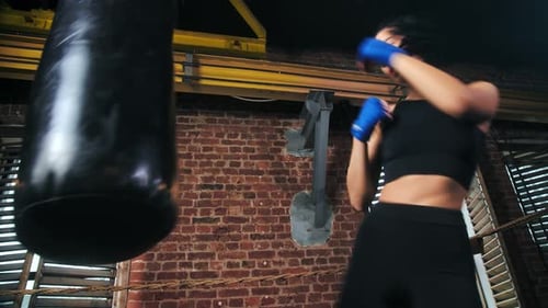 Professional Mma Fighter Slim Girl with Perfect Body Exercising at Loft Boxing Studio Background