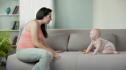 Mother and Infant Playing Together at Home