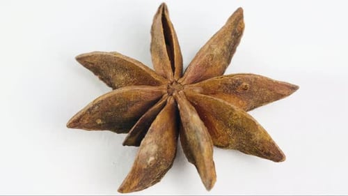 Close Up Star Anise Spice on White Surface