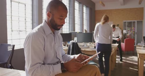 Young creative professionals working in a modern office
