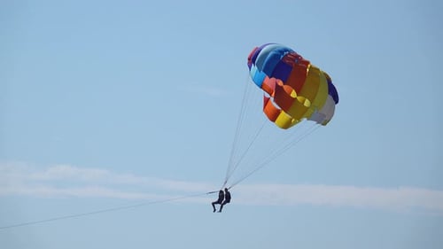 Couple Doing Boat Parachute Together