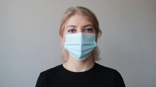 Woman Wearing Surgical Mask for Protection