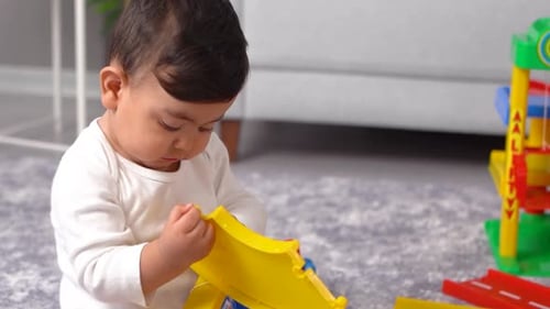 Baby exploring while playing.