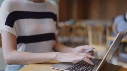 young asian woman user worker using typing on laptop noteboo