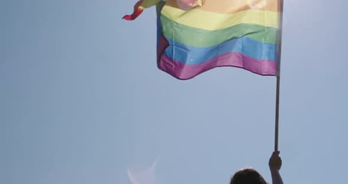 Rainbow Flag Waving Proudly in the Sky