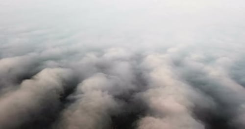 Beautiful Misty Dawn. Flying Above the Clouds, Drone Video