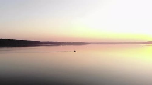 Aerial View of Boats with Fishermen on the Huge Surface of the Lake in the Rays of the Summer