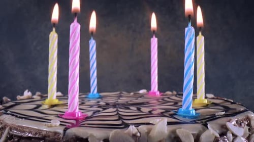 Celebratory Birthday Cake with Burning Candles