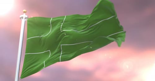 Realistic Green Cross Flag Waving on Pole Against Cinematic Sky