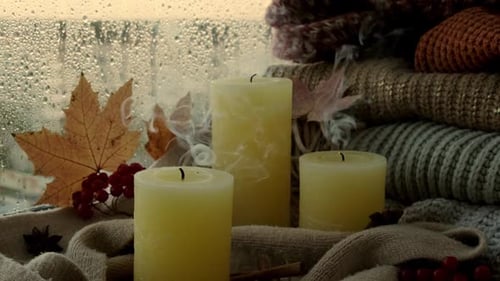 Autumn Scene with Lit Candles near Window