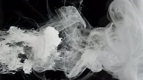 Dissolution of White Paint on a Black Background