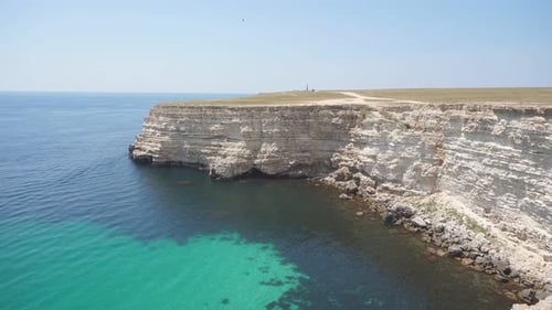 View of the Emerald Crystal Clear Sea, the Horizon on a Sunny Day