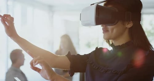 Woman Using VR Headset in Bright Office