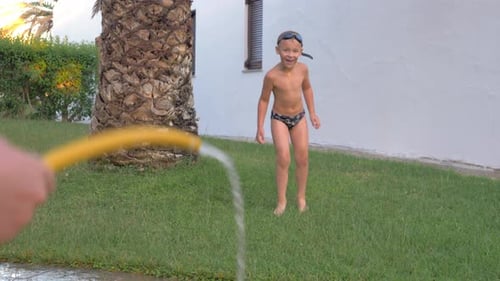 Fun with water on hot summer day