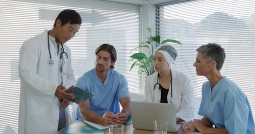 Medical Professionals Collaborating on Patient Care