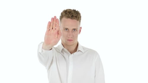 Stop Gesture By Stopping Businessman on White Background