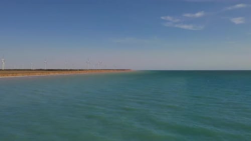 Aerial View of the Wind Turbines Near the Sea