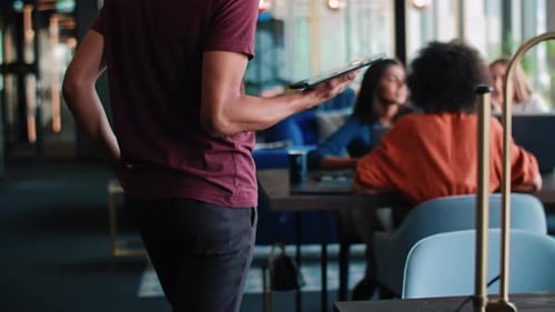 Man explaining business strategy to coworkers