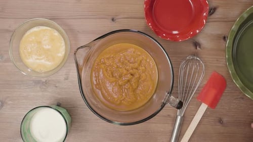 Time lapse. Step by step. Mixing ingredients for pumpkin pie filling.