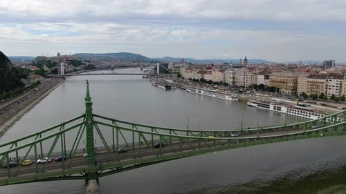 Drone over Liberty bridge on Danube river in Budapest, Hungary