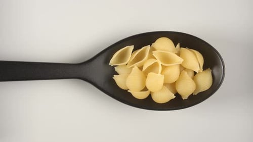 Dry Shell Pasta Filling Black Spoon