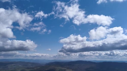 Timelapse of Majestic Clouds Shining Through the Colorful Blue Sky