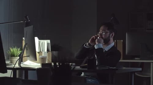 Man Working Late in the Office