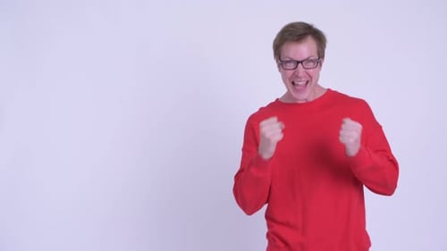 Enthusiastic Young Adult Gives Thumbs Up