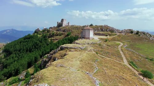 Aerial View of Ancient Castle on Mountain Hill Pine Forest on Mountain Slope